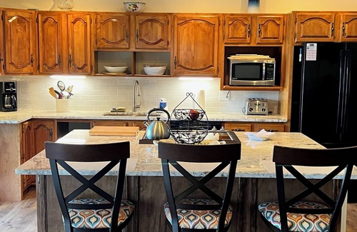 Freedom House | Lakefront home on Leavitt Bay, with private beach, dock, and an amazing view