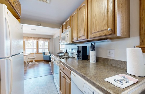 The Bays Cottage | Lakefront home with private beach, access to dock/fishing/kayaks/boat slip