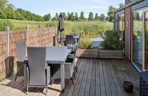 Stubbekobing House | Lakefront luxury holiday retreat with cozy loft