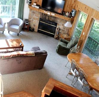 Tomah House | Lakefront Vacation Rental with a Deck and Hot Tub near Wisconsin Dells