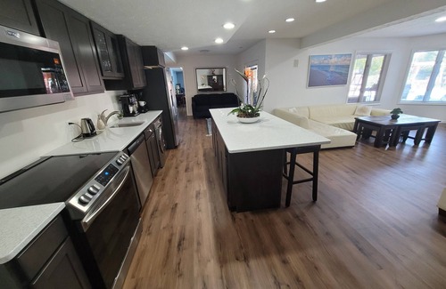 West Omaha House | Lakefront walk-out basement with private Pool, Hot Tub, Sauna and Pool Table 🏖