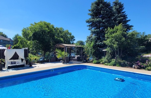 West Omaha House | Lakefront walk-out basement with private Pool, Hot Tub, Sauna and Pool Table 🏖