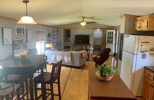 Quinlan House | Lakeside Cabin on 500 Acre Ranch with Year-round Pool