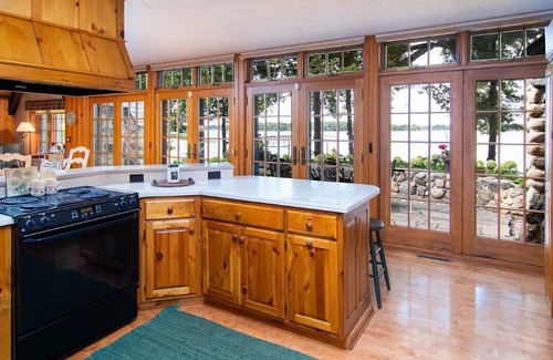 Nevis House | Lakeside estate with 350' of shoreline on Lake Belle Taine