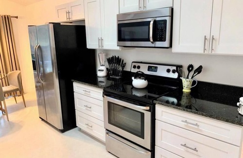 Lake Berkley House | Lakeside house, huge south facing pool with spa, lake view, & Disney at 8 miles