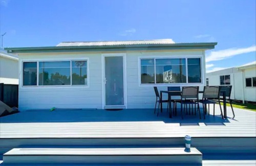 Wallis Lake House | Lakeside House Tuncurry with deck overlooking the lake