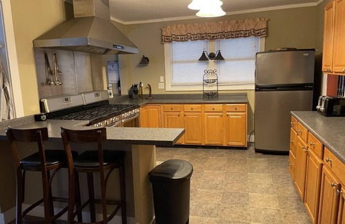 Long Lake Cabin | Lakeside Lodge- Wraparound Deck & Private Sandy Beach with Floating Dock