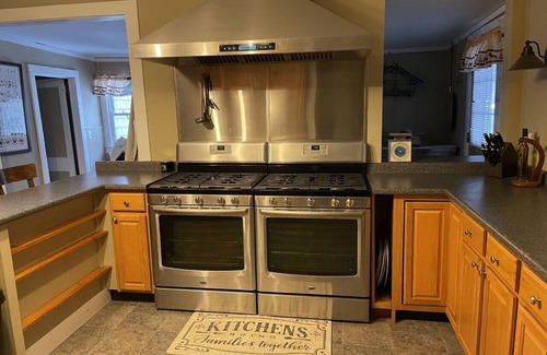 Long Lake Cabin | Lakeside Lodge- Wraparound Deck & Private Sandy Beach with Floating Dock