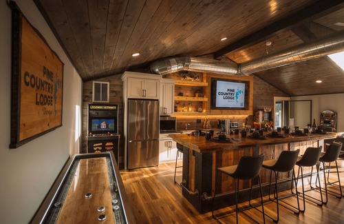 Minong Cabin | Lakeside Mansion 10,000SF- Heated Pool - Two Hot Tubs - Theater- Sleeps up to 62