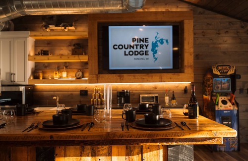 Minong Cabin | Lakeside Mansion 10,000SF- Heated Pool - Two Hot Tubs - Theater- Sleeps up to 62