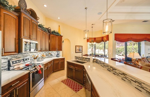 Pelican House | Lanai w/Heated Pool at Cape Coral Escape!