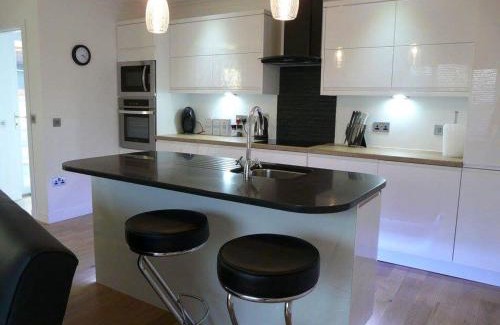 Wick House | Langley Cottage with patio, spacious rooms - part of Langley Serviced Apartments several properties in Wick