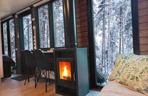 Muonio Ski Chalet | Lapelland Village - Borealis Village with a Nature View, Fireplace, Sauna, Kitchen