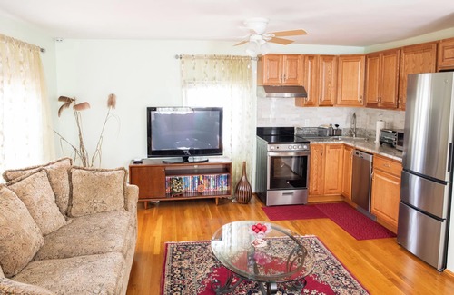 West Roxbury Apartment | Large 5-Bed Modern Family Retreat with Kitchen & Free Parking Near Boston!