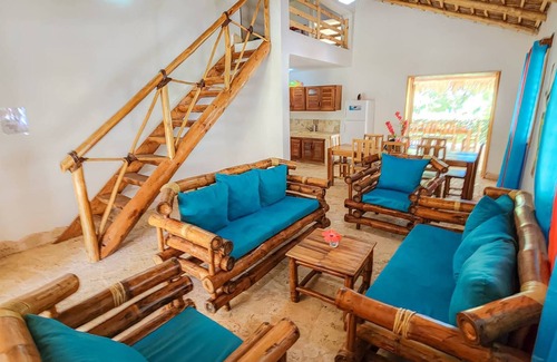 Las Galeras Villa | Large Caribbean villa just minutes from beautiful white beaches with palm trees