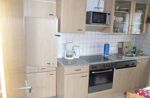 Horumersiel Apartment | Large garden with playground, patio, garden shed, close to the village, individual, 3 living units.