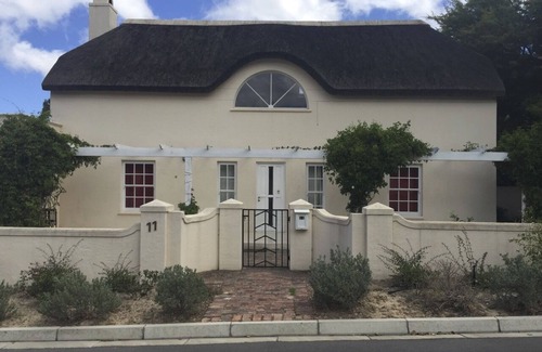Franschhoek House | Large guest room ensuite, 40 square meters, Flat TV, Fridge , roof fan.