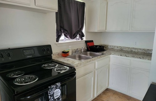 Eastern Division Apartment | Large parking lot/sleeps 8