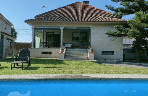 Vigo House | Large semi-detached house with pool in Vigo. Beach at 9min