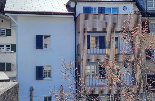 Schwanden Apartment | Large studio in Schwanden with mountains and river. 5 minutes to train station.