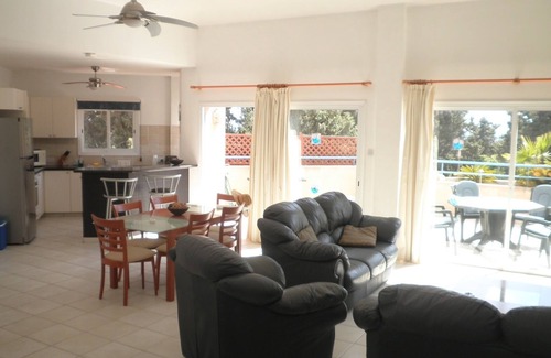 Paphos Apartment | Large sun terrace, balcony, two pools, all major UK TV channels & unlimited wif