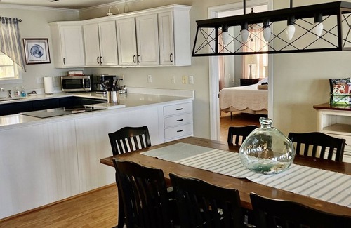 Gasque Cottage | Last minute discounts! Screened porches, dog friendly, fenced yard