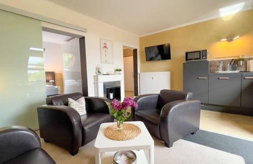 Duhnen Apartment | Leuchtfeuer Voßhörn - House Leuchtfeuer - Bright vacation apartment with tasteful