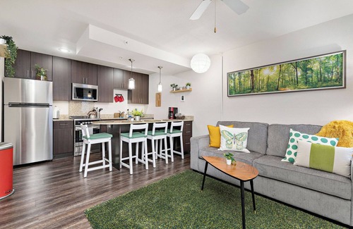 Prairie Village Apartment | Life is Suite King Bed Fast WiFi Free Parking Spot Dedicated Work table & chair