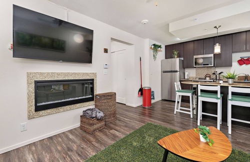 Prairie Village Apartment | Life is Suite King Bed Fast WiFi Free Parking Spot Dedicated Work table & chair