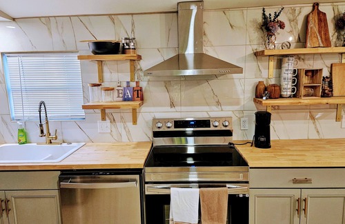 Mountain Island Apartment | Located close to shops & restaurants, near the Corning Optical Comm Building