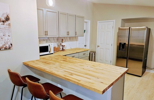 Mountain Island Apartment | Located close to shops & restaurants, near the Corning Optical Comm Building