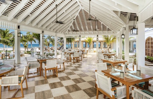 Montego Bay Condo | Located in Founders Cove | Living room Balcony or patio | Semi-private pool