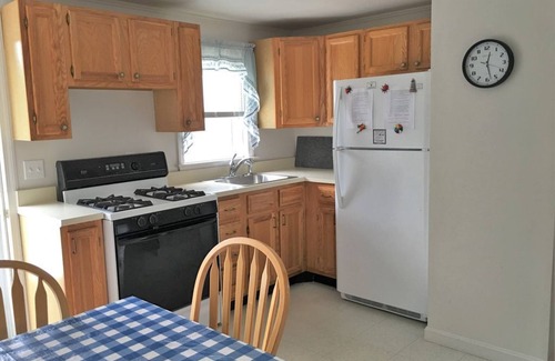 Falmouth Condo | Location, Location! New listing Steps to Surf Drive Beach, sleeps 5,deck, yard