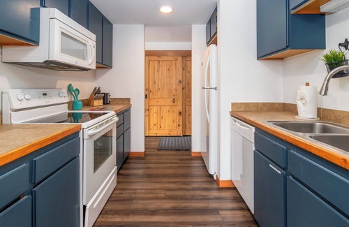 Lakeside Village Condo | Location. Views. Fireplace. Pool. Hot tub. Lake.