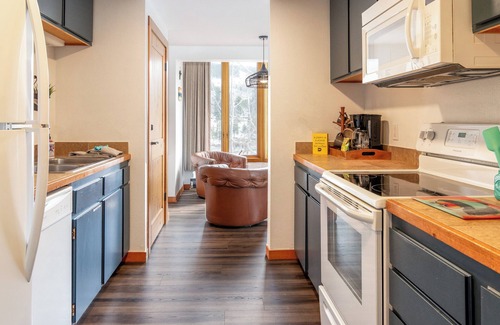 Lakeside Village Condo | Location. Views. Fireplace. Pool. Hot tub. Lake.