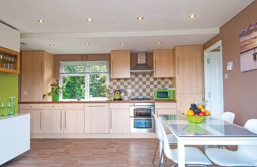 Low Newton Ski Chalet | Lodge with one king-size double with TV.