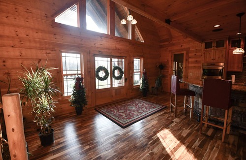 Commiskey House | Log cabin on 108 private acres - cozy inside, adventure outside!