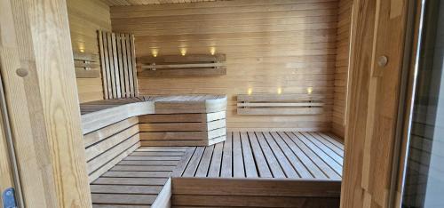 Torreby House | Log cabin with pool, sauna and boat by Torreby Castle