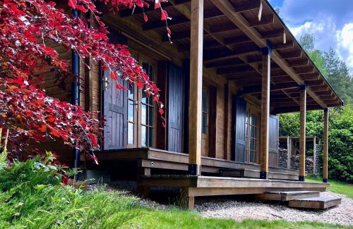 Nova Bystrice Apartment | Log cabins at Iron Rose in Czech Canada