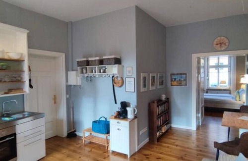 Rheinsberg Condo | LoggiaHaus am Schloss, Pelle vacation apartment on the ground floor with terrace and courtyard garden