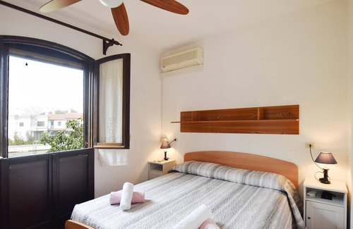 Rosolina House | Look forward to a cozy townhouse equipped with everything you may need for a vacation in Italy.