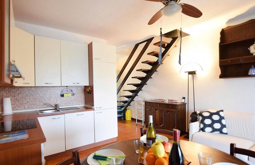 Rosolina House | Look forward to a cozy townhouse equipped with everything you may need for a vacation in Italy.