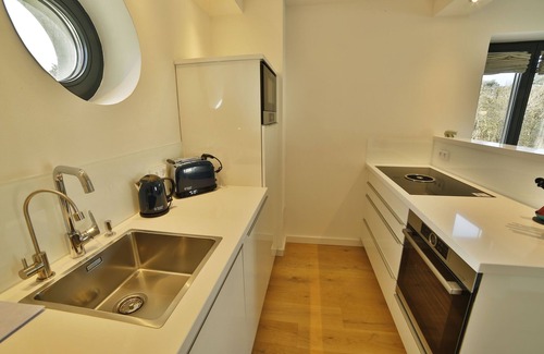 Prora Apartment | Lotsenloft 16 in Prora Düne 7 with its own sauna, fireplace and roof terrace