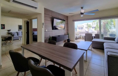 Libertad Apartment | Lovely 2 Bedroom Condo, 2 Pools Gym 5 min Downtown