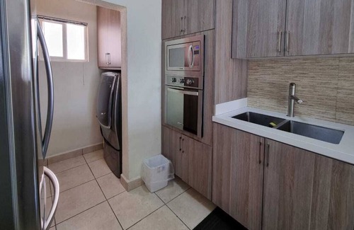 Libertad Apartment | Lovely 2 Bedroom Condo, 2 Pools Gym 5 min Downtown