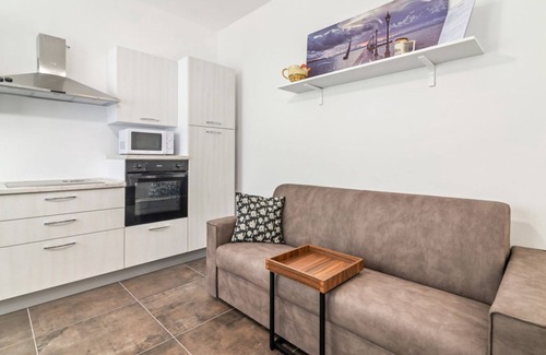 Abano Terme Apartment | Lovely apartment for 4 people in a completely renovated building, located in a quiet residential area a stone's throw from the historic center of Abano Terme. The flat is 5 minutes away by foot from San Lorenzo Cathedral, 10 minutes away from Piazza Merc