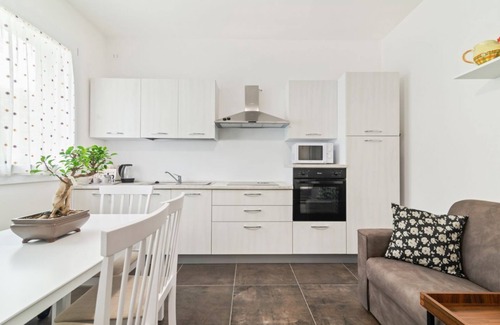 Abano Terme Apartment | Lovely apartment for 4 people in a completely renovated building, located in a quiet residential area a stone's throw from the historic center of Abano Terme. The flat is 5 minutes away by foot from San Lorenzo Cathedral, 10 minutes away from Piazza Merc