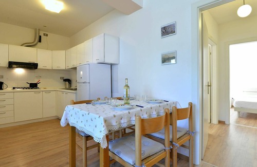 Caldonazzo Apartment | Lovely apartment for 4 guests with WIFI, TV, patio and pets allowed