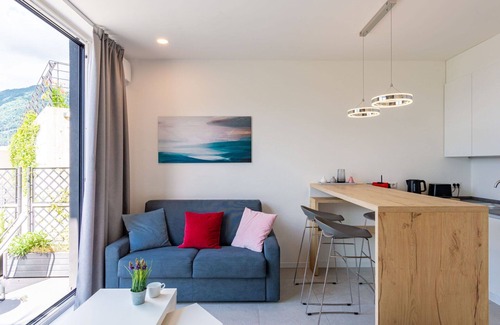 Nesso Apartment | Lovely apartment for 3 guests with A/C, WIFI, pool, TV and terrace