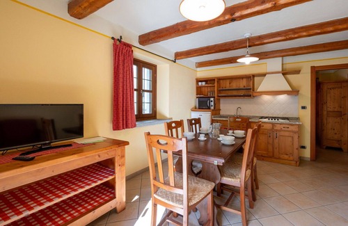 Sampeyre Apartment | Lovely apartment for 4 guests with WIFI, pool, TV and terrace